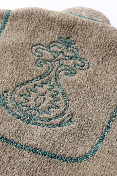 Jacket in faux fur with embroidery on the back